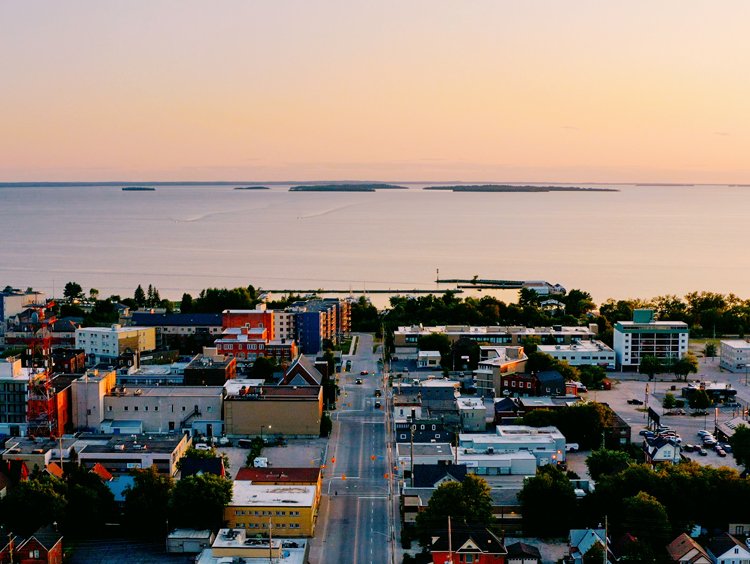 Aerial view of downtown North Bay looking out over the waterfront and Lake Nipissing at dusk